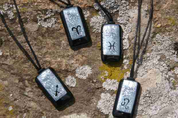 Detail of zodiac motif jewellery