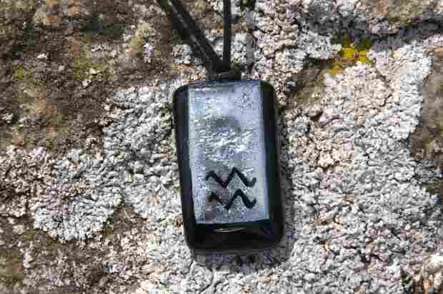 Detail of zodiac motif jewellery