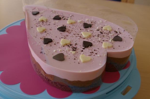 Cake with layered strawberry mousse and chocolate mousse